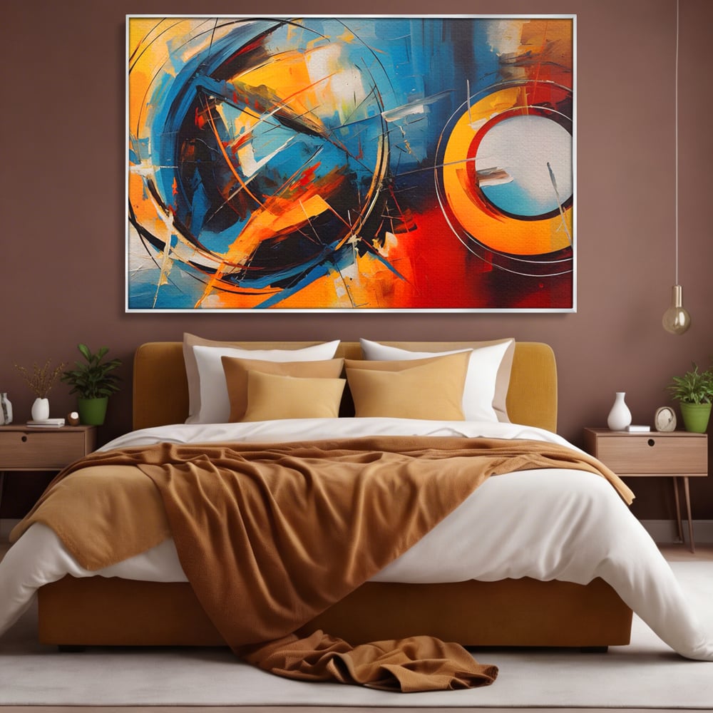 Tablou canvas cu pictura abstracta cu cercuri si linii, in rama de aluminiu argintiu, pe perete intr-un dormitor